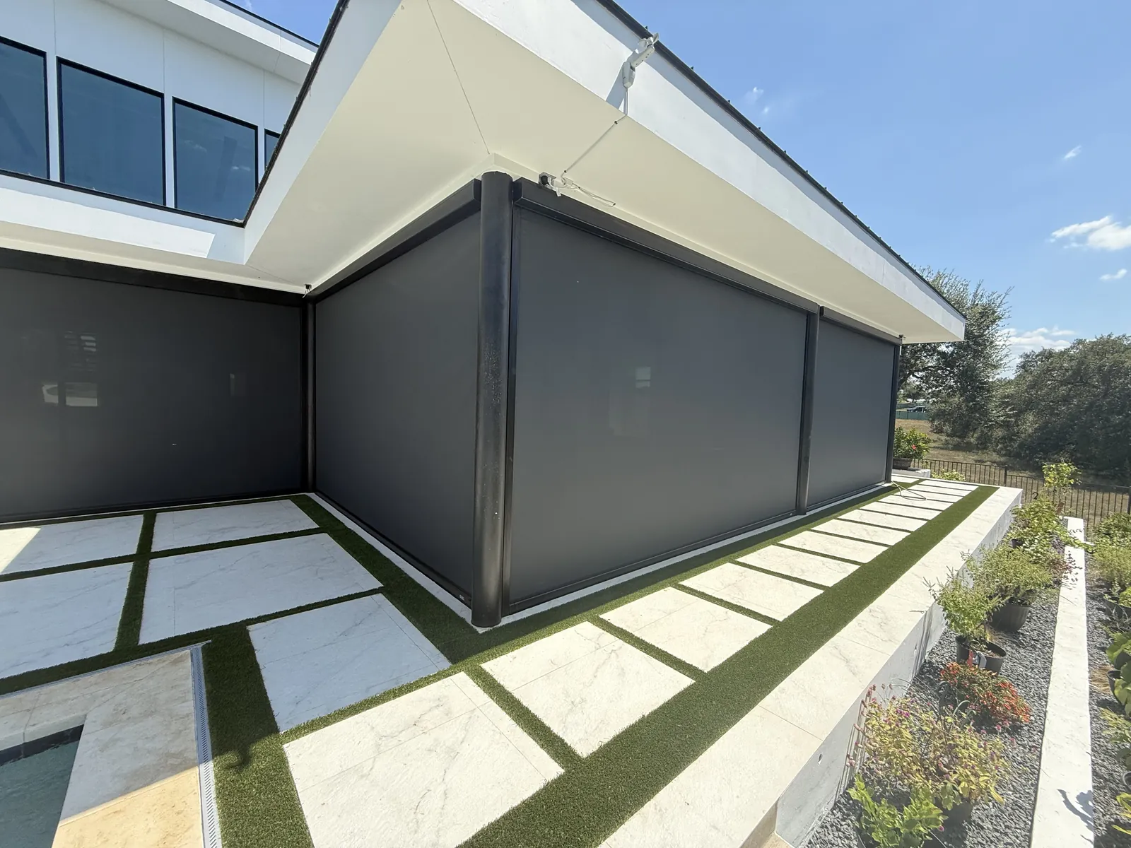 Completed magnatrack motorized & retractable screens project by TWT Outdoor Living