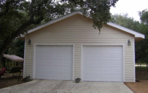 Completed siding project on seperate two car garage